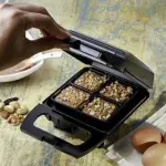 Geepas 4Pcs Brownie Maker, 4 Bites At A Time ,Non-Stick Cooking Plate , Safety Lock , Cool Touch Handles , Skid -Resistance Feet , Power On & Ready Indicator - Black